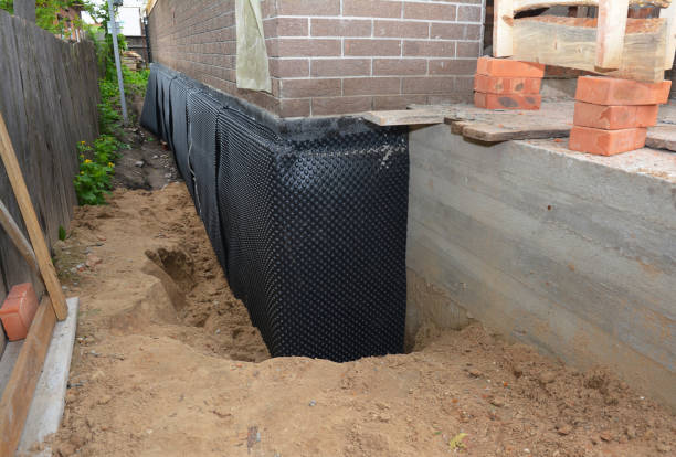 SJ Waterproofing Pros technician performing targeted Crawl Space Encapsulation assessment in Marquette, MI